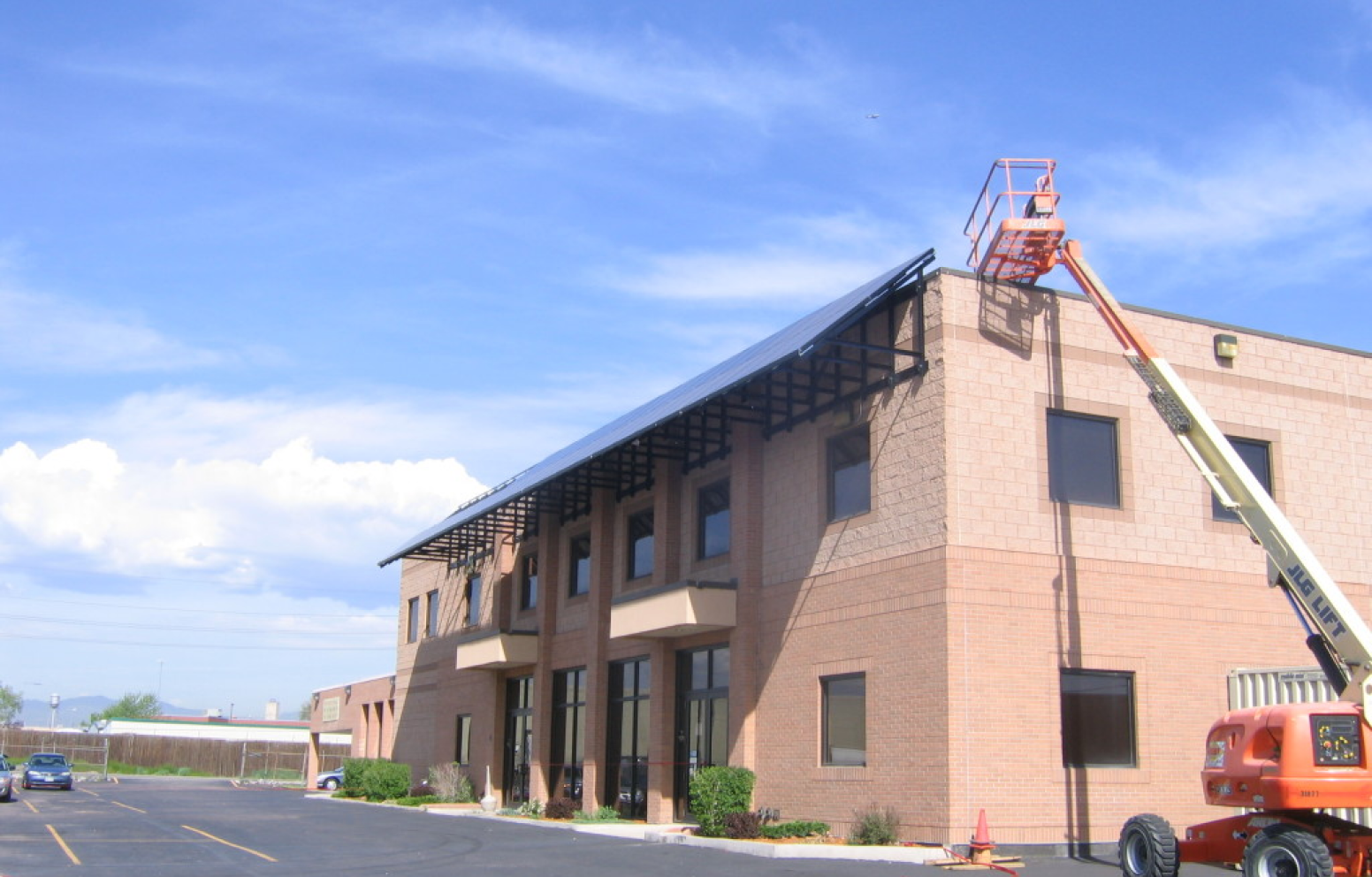 American Solar Partners with a front-facing slanted solar panel installation for a commercial client