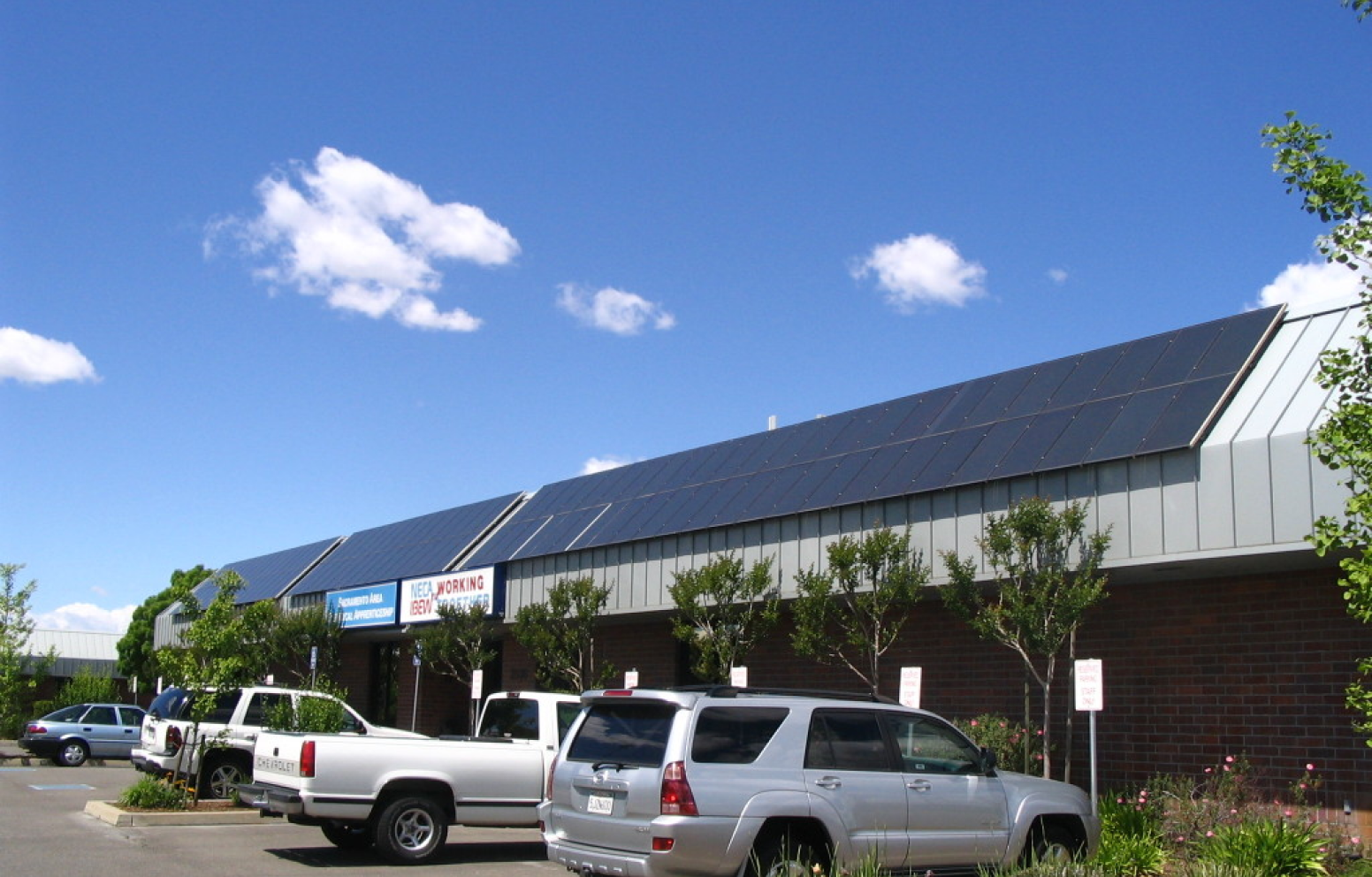American Solar Partners with a slanted solar panel installation for a commercial client
