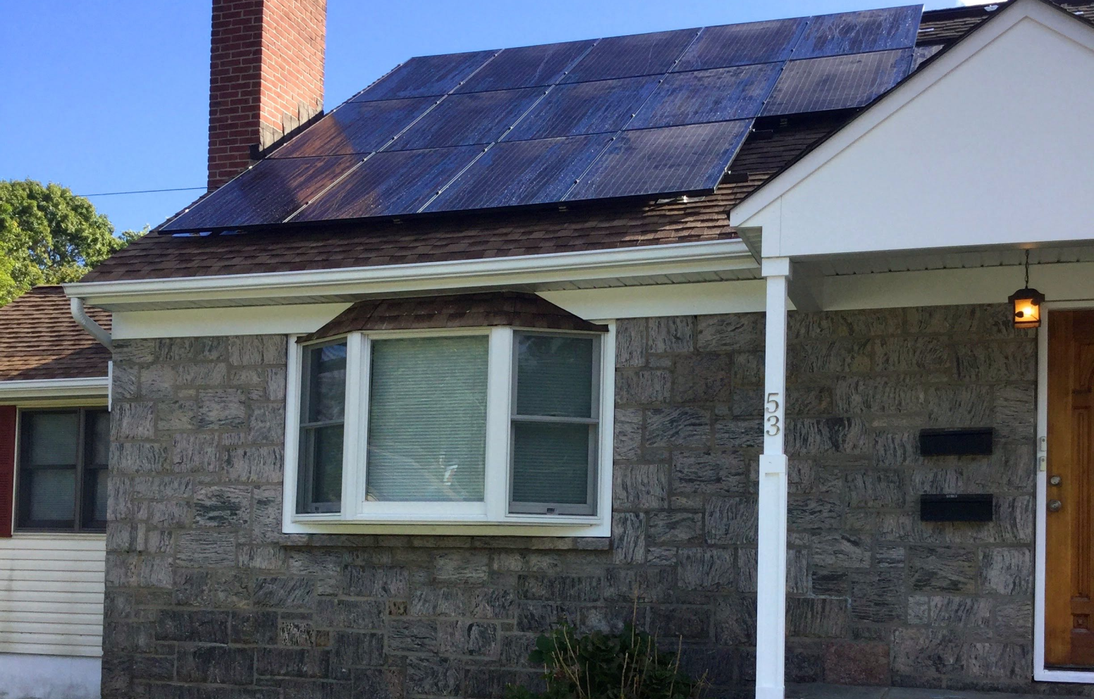 American Solar Partners - Slanted solar panel installation on the front of a slanted residential roof