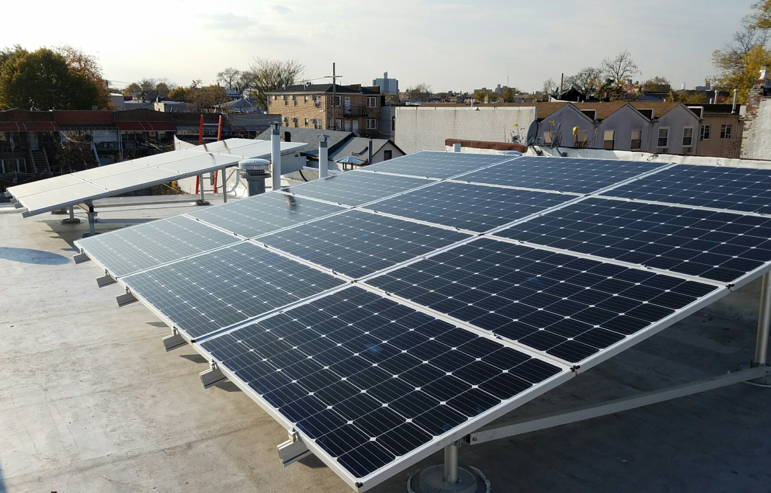 American Solar Partners - Flat roof solar panel installation