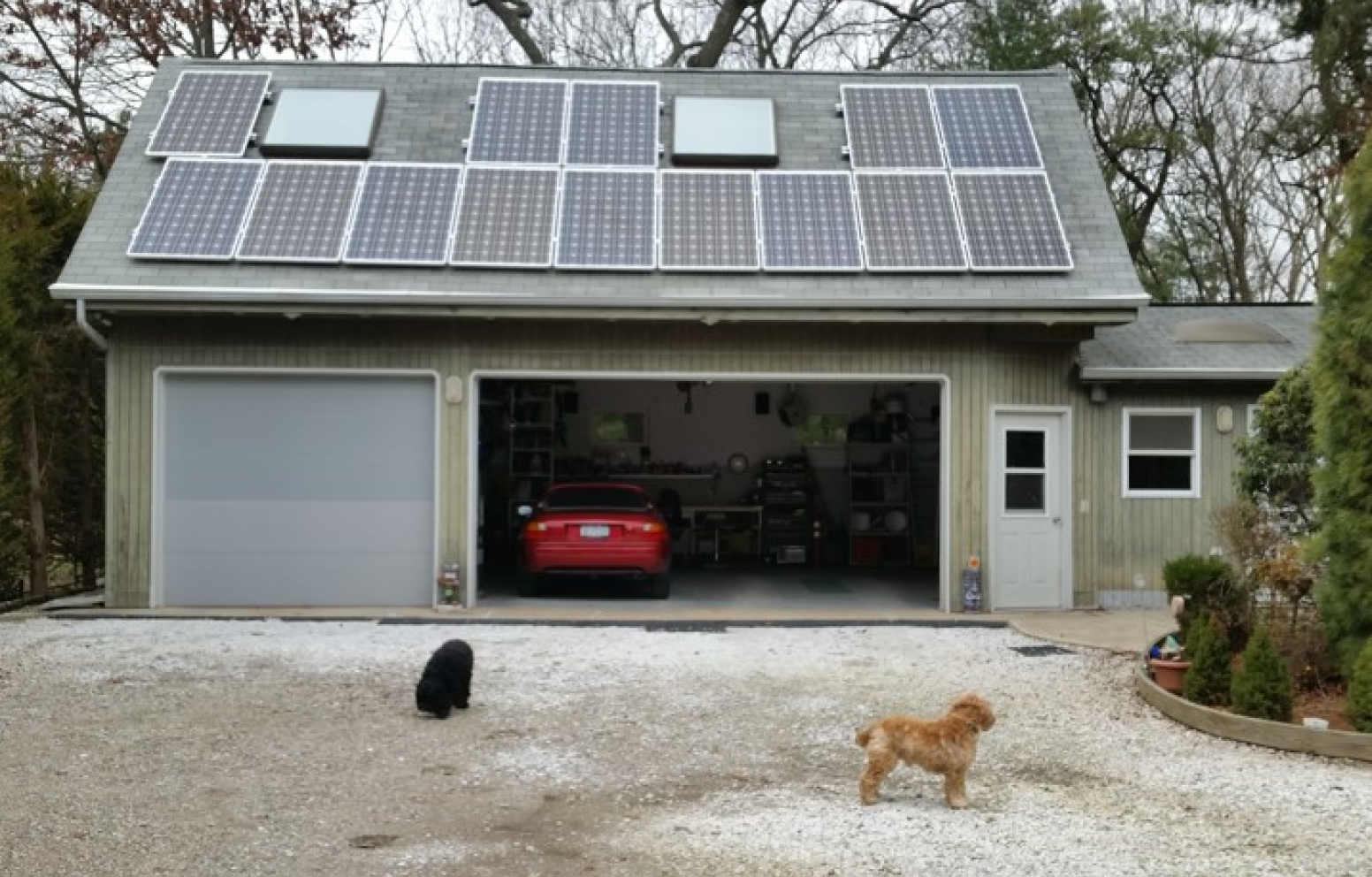 American Solar Partners - Slanted solar panel installation on a slanted residential garage roof