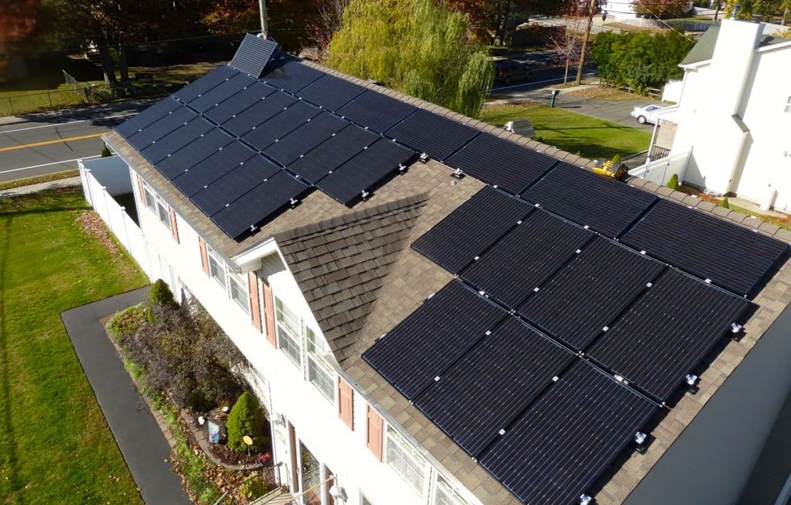 American Solar Partners - Solar panel installation on a pitched roof