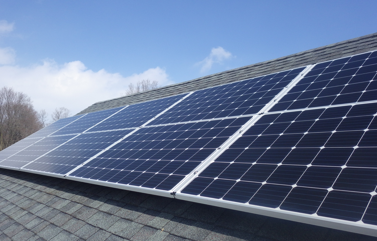 American Solar Partners - Solar panel installation on a pitched roof